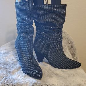 Black studded mid high boots